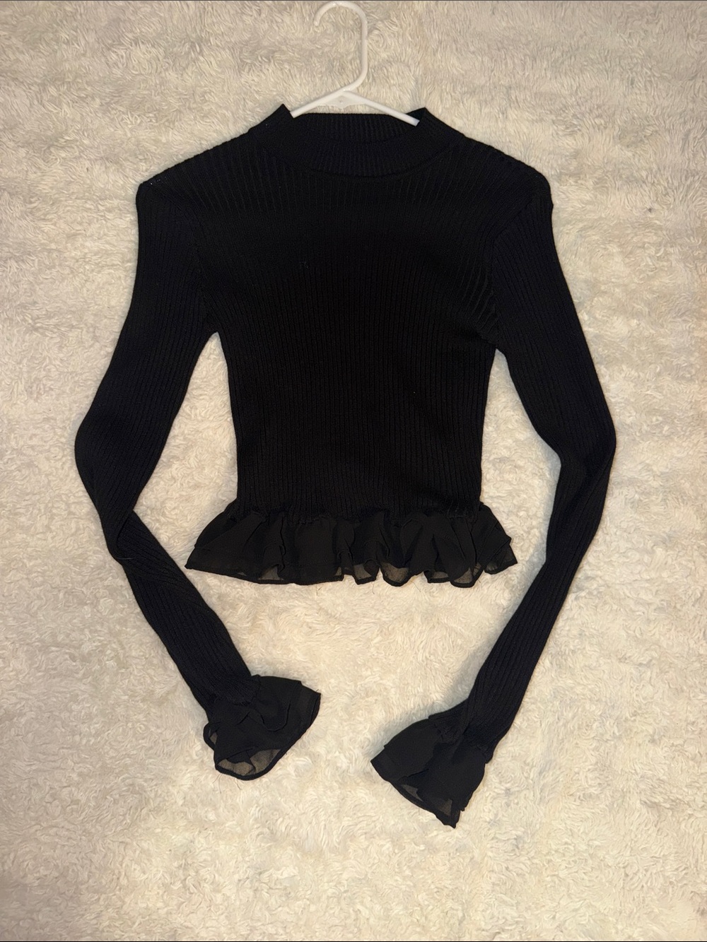 LULUs Black Ruffle-Hem Ribbed Long-Sleeve Top